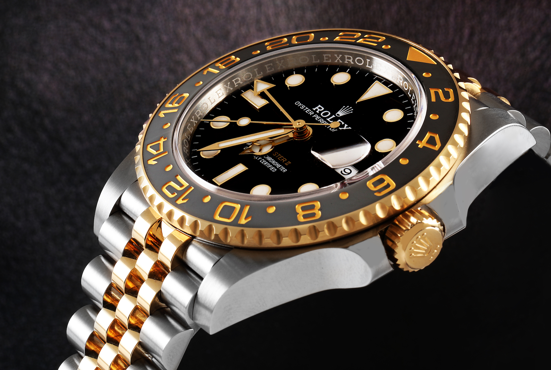 Every Rolex Bezel Type Explained - Rolex GMT Master II Steel and Gold 126713 GRNR