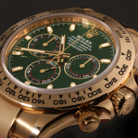 rolex daytona gold green dial review