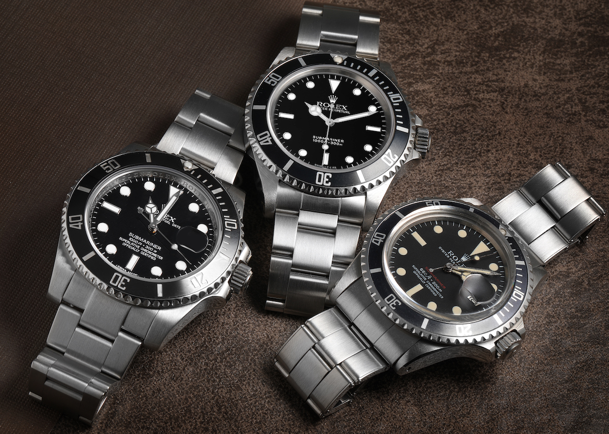 Different generations of the Rolex Submariner ref 1680, ref 14060, and ref 116610