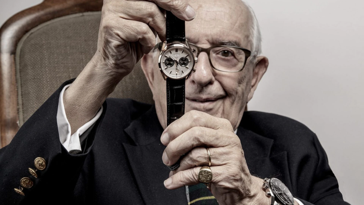 Jack Heuer holding one of his iconic designs: the Carrera