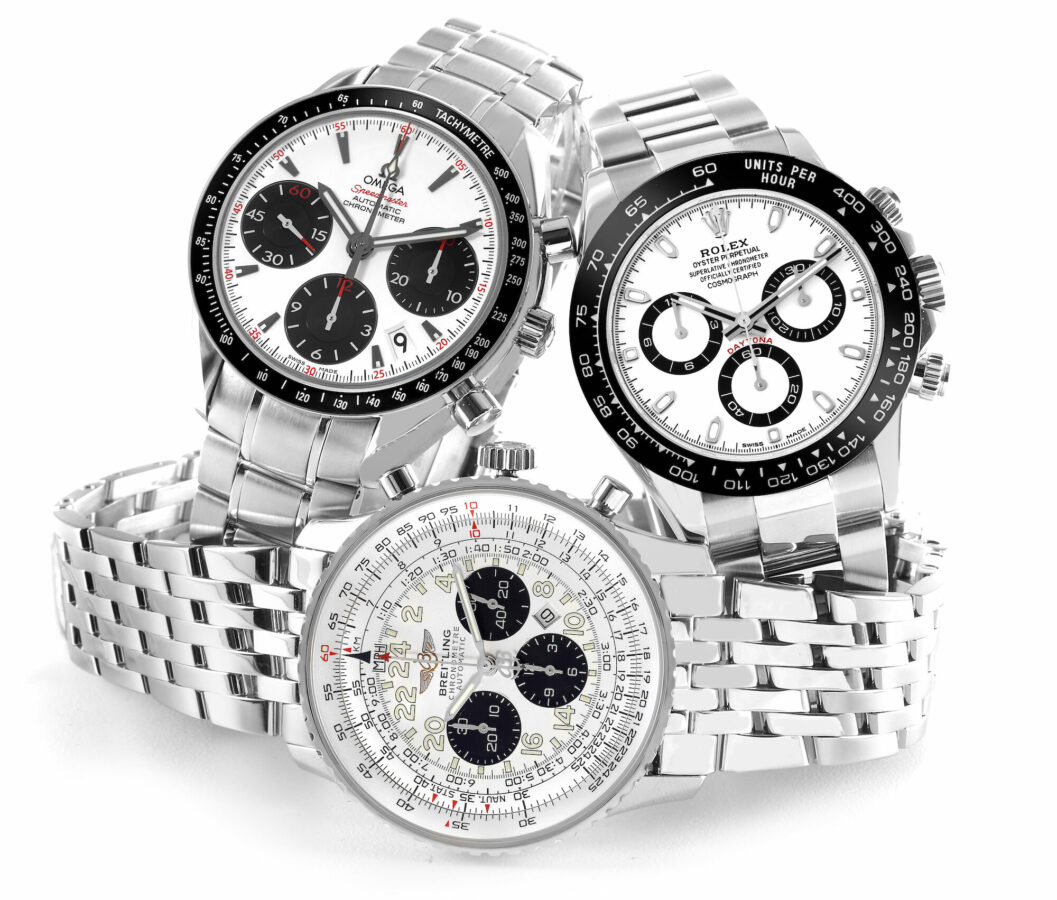 Panda Dial Watches - Omega Speedmaster Date, Rolex Daytona 116500, and Breitling Navitimer Cosmonaute A23322
