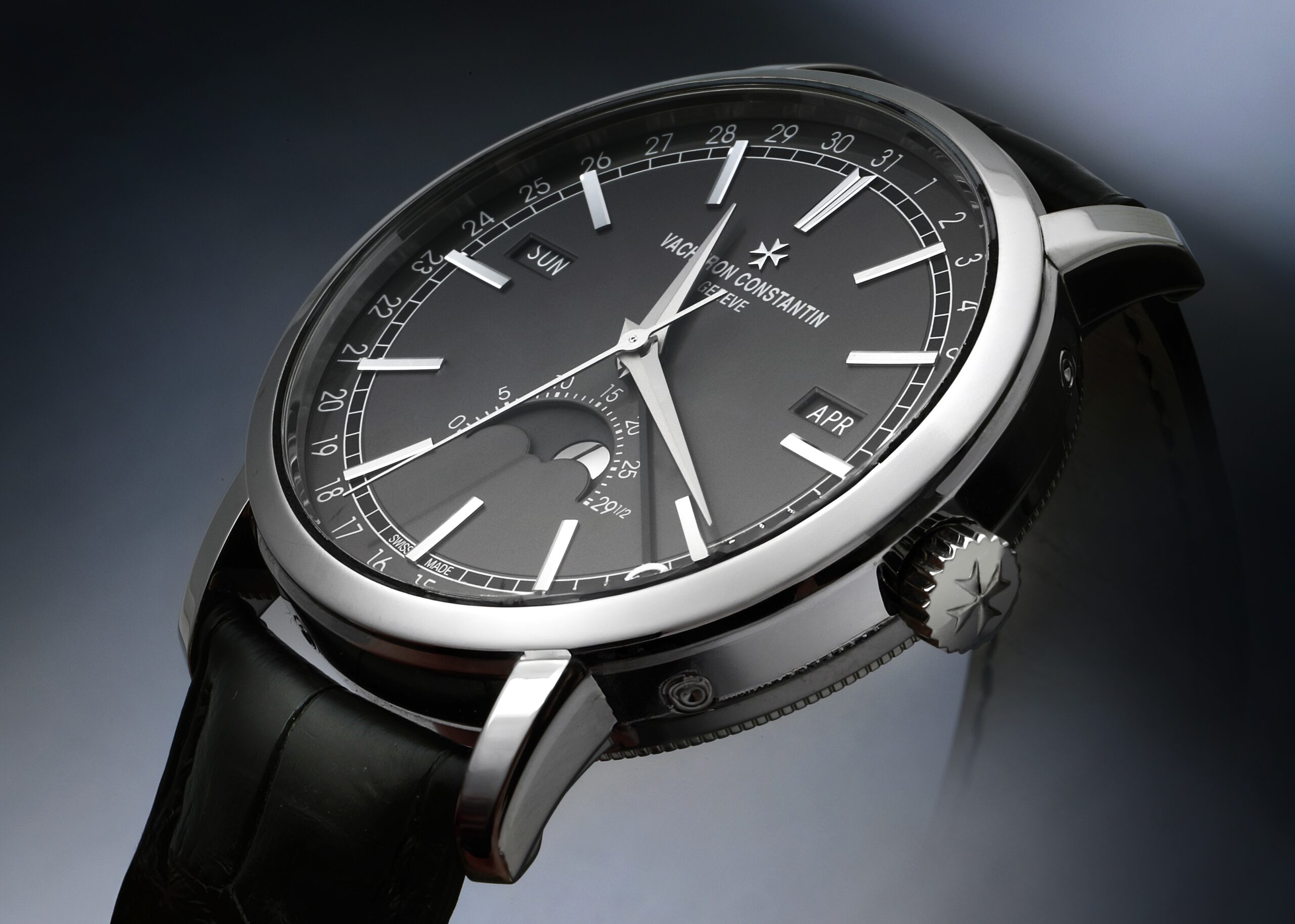 Vacheron Constantin Traditionnelle Complete Calendar reference 4010T in white gold with a grey dial and moonphase indicator.