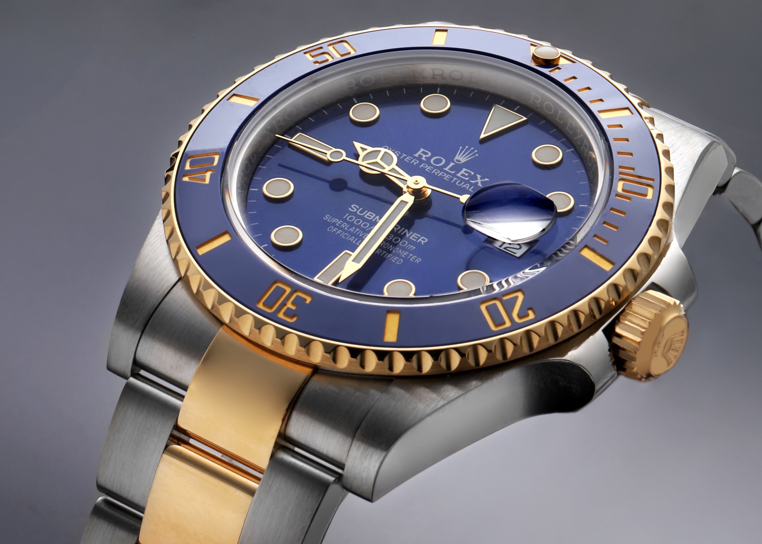 Two-tone Rolex Submariner 'Bluesy' in yellow gold and stainless steel, featuring a blue dial and blue bezel.
