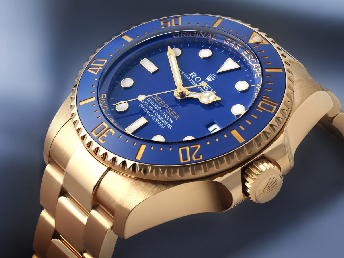 The Rolex Deepsea 136668LB, an 18ct yellow gold dive watch with a vibrant blue dial and ceramic bezel.