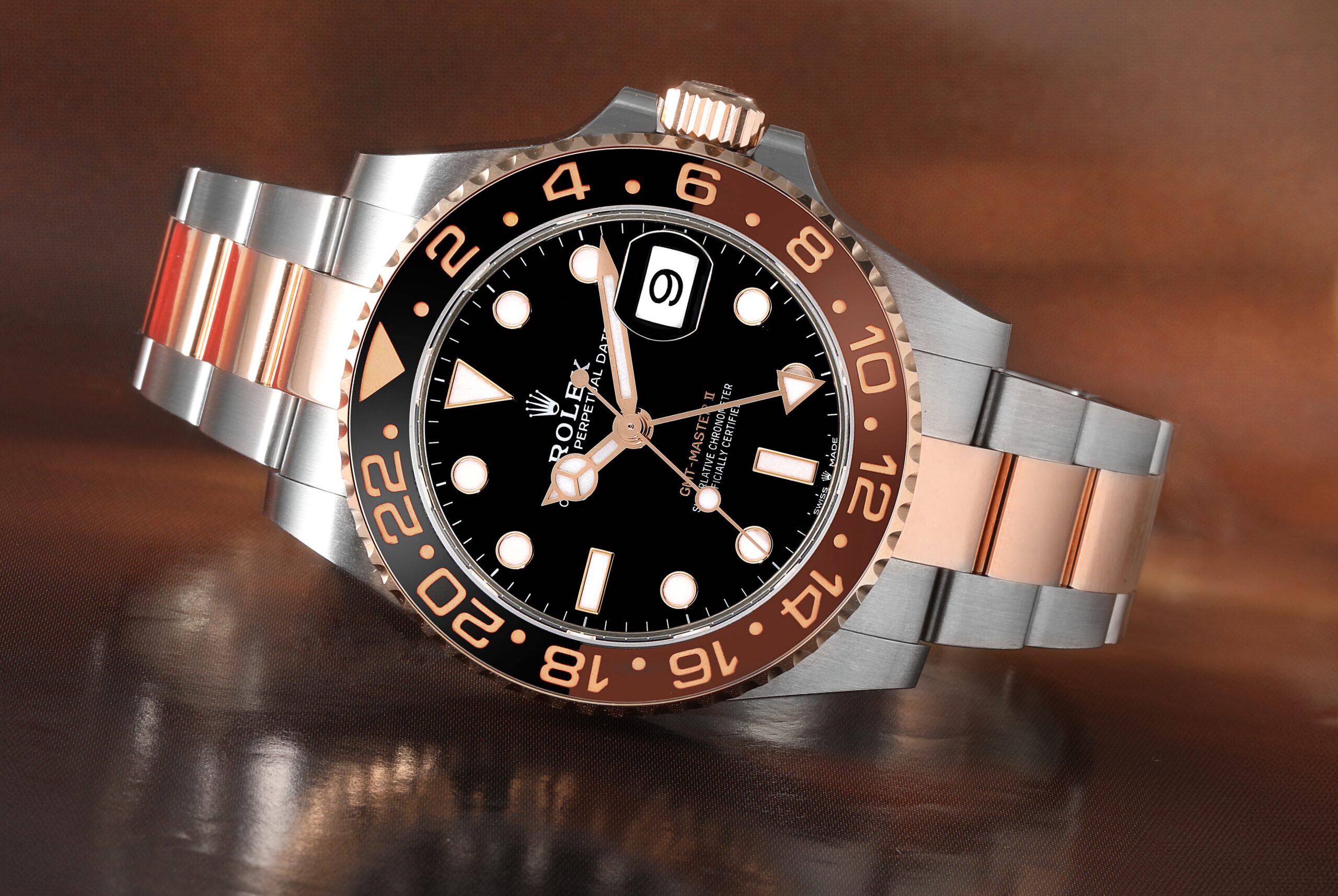 Rolex GMT-Master II 'Root Beer' (Ref. 126711CHNR) in Everose Rolesor (steel and Everose gold) with a black and brown ceramic bezel and black dial.