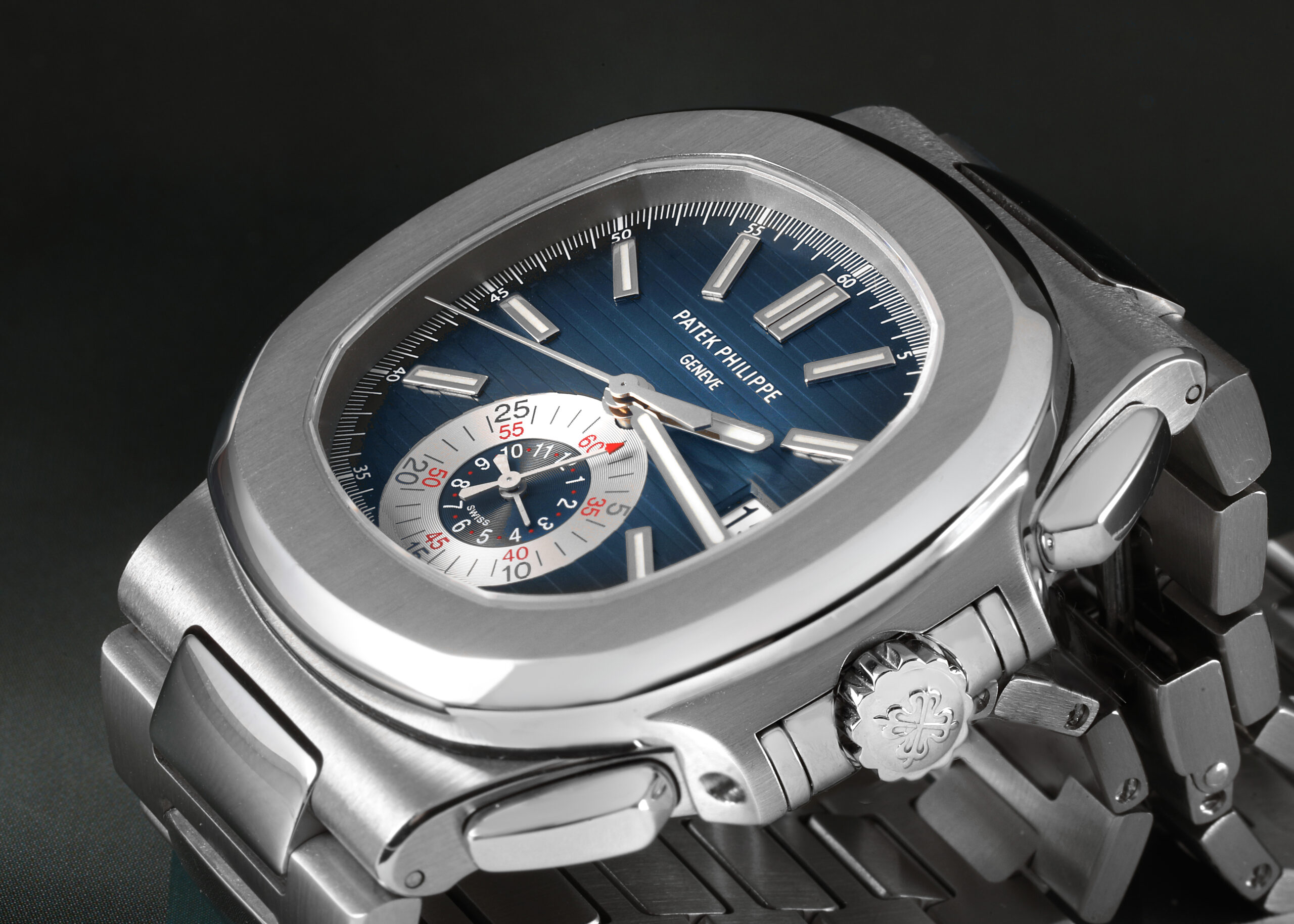 Close-up of a Patek Philippe Nautilus Chronograph 5980-1A in steel, showing the blue dial and chronograph complication.