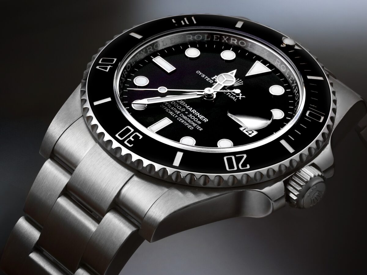 A detailed close-up of a Rolex Submariner 126610, the hero image for a guide to the best one-watch collections.