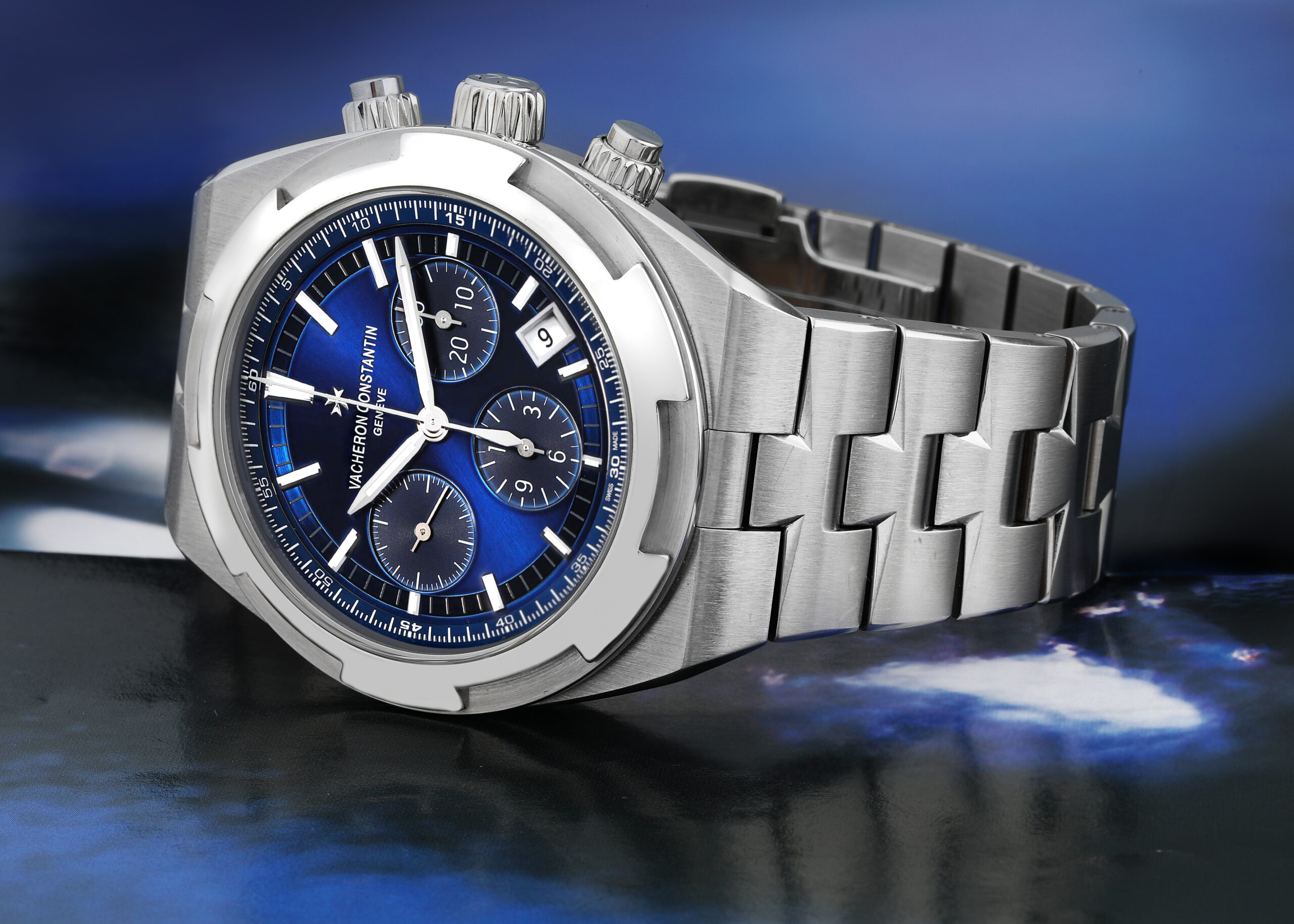 Close-up of a Vacheron Constantin Overseas Chronograph 5500V, featuring its iconic blue dial and integrated steel bracelet.