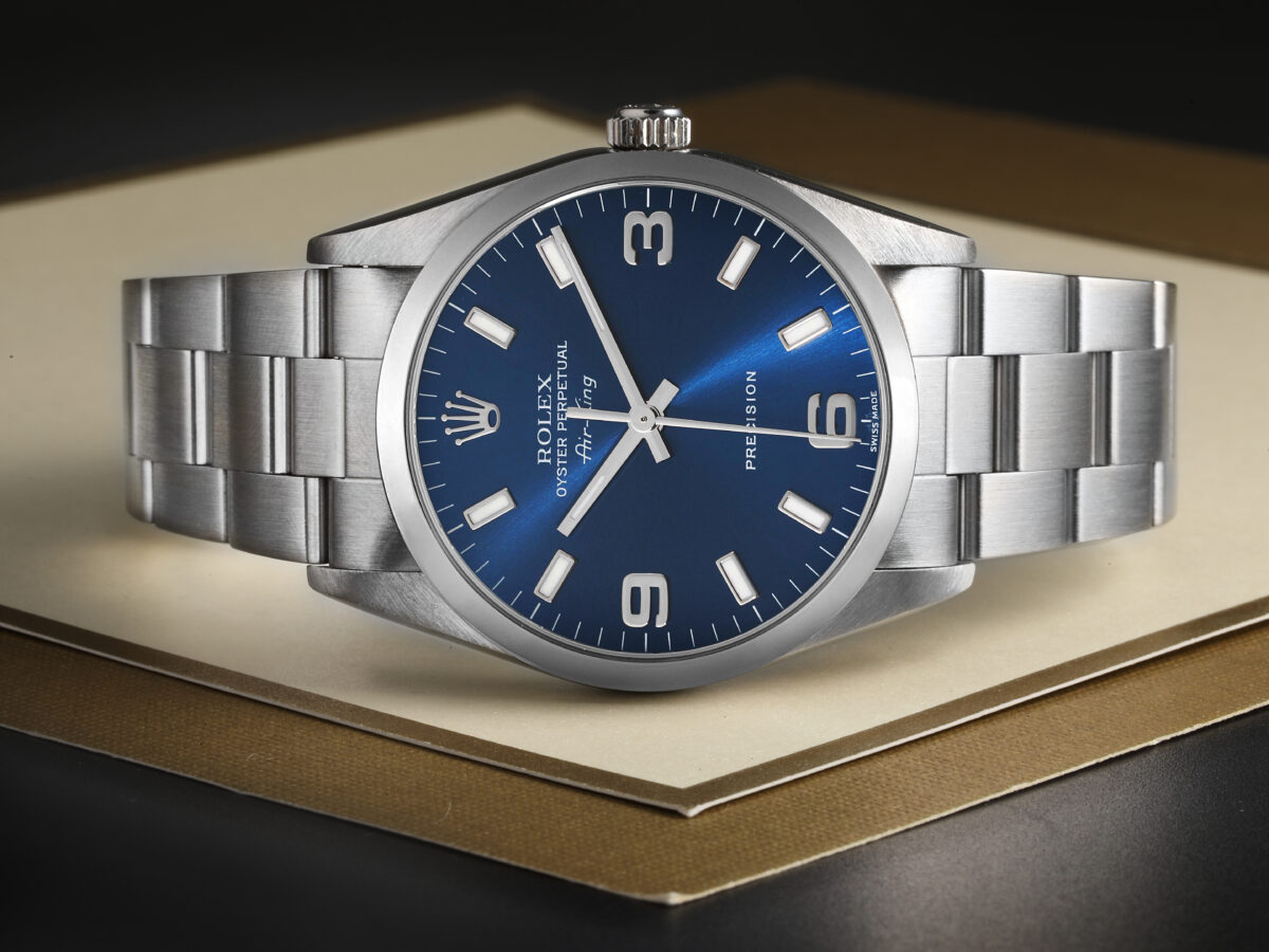 A Rolex Air-King 14000 with a blue 3-6-9 dial, representing one of the most affordable pre-owned Rolex watches for men.