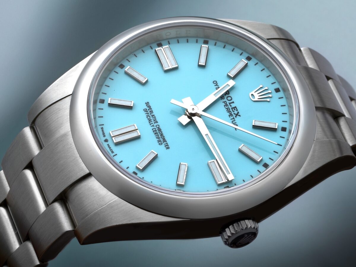 A detailed close-up of the Rolex Oyster Perpetual 41 with its iconic 'Tiffany' blue (turquoise) dial.