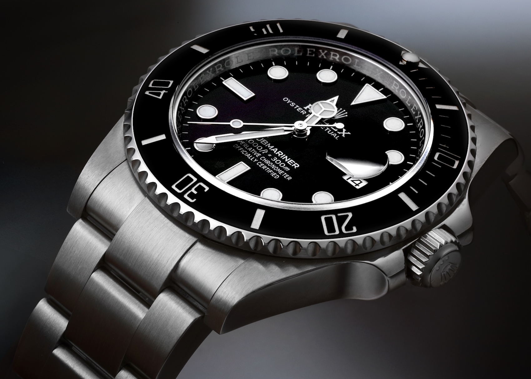 A classic stainless steel Rolex Submariner Date with a black dial and black ceramic bezel, the quintessential modern dive watch.