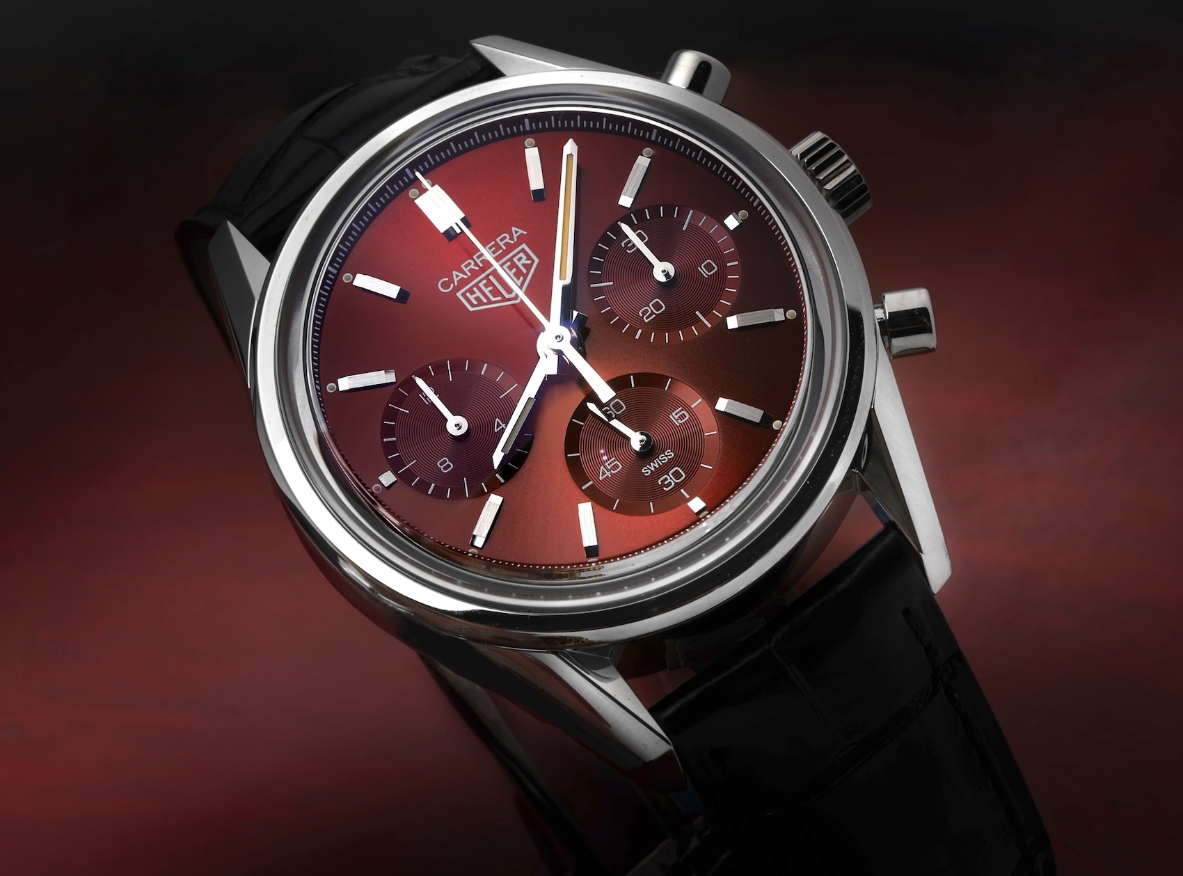 The TAG Heuer Carrera Red Dial Limited Edition, featuring a striking crimson sunray dial with three chronograph subdials.