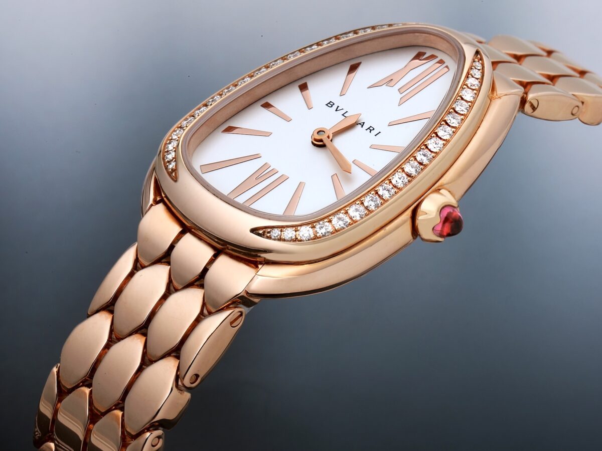 Side profile macro shot of Bvlgari Serpenti Seduttori showing the depth of the diamond bezel and polished rose gold finish.