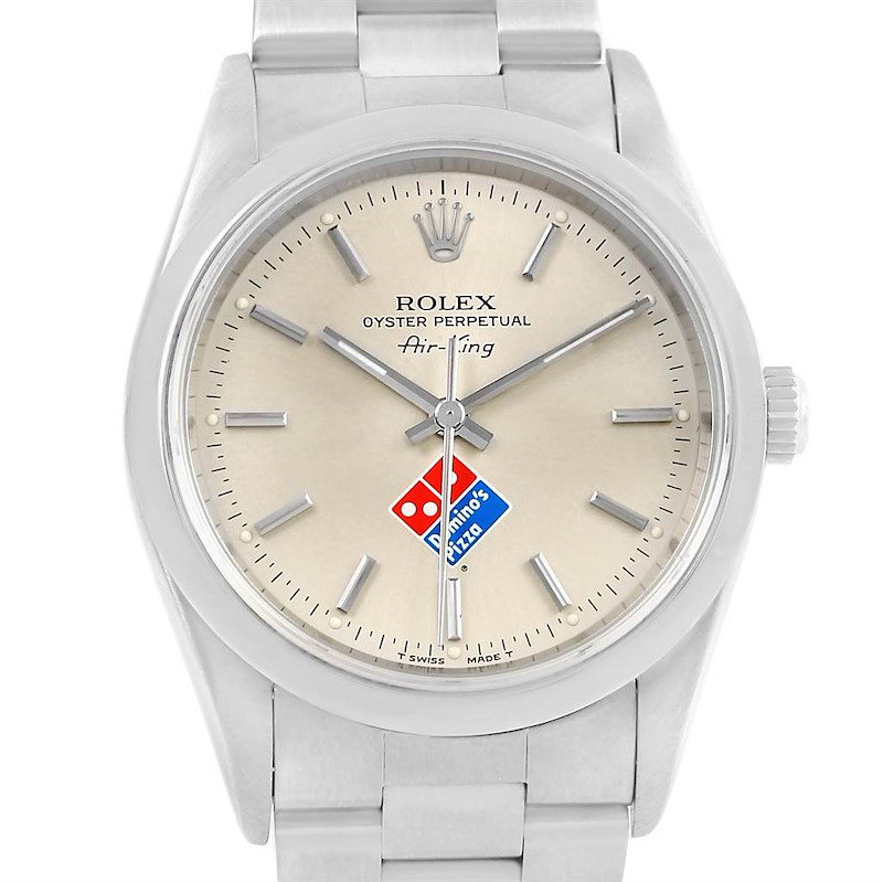 Close-up of a vintage Rolex Air-King silver dial featuring the red and blue Domino's Pizza logo at the 6 o'clock position.