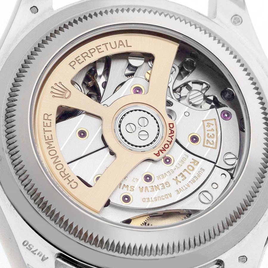 Macro view of the Rolex Calibre 4132 automatic movement visible through the sapphire caseback, featuring a yellow gold winding rotor.