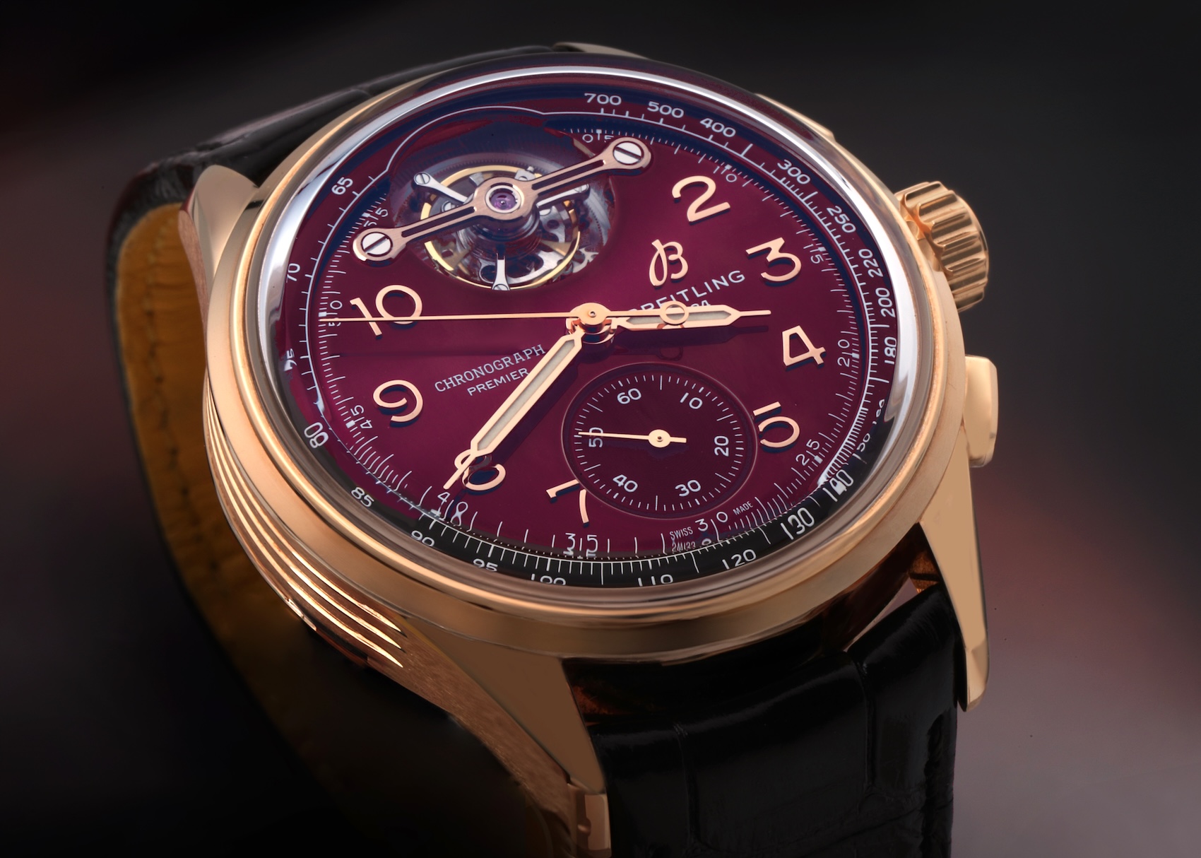  Breitling Premier B21 Tourbillon 42 Rose Gold watch with a burgundy dial, representing the Divine Damson popular colors for 2026 trend.