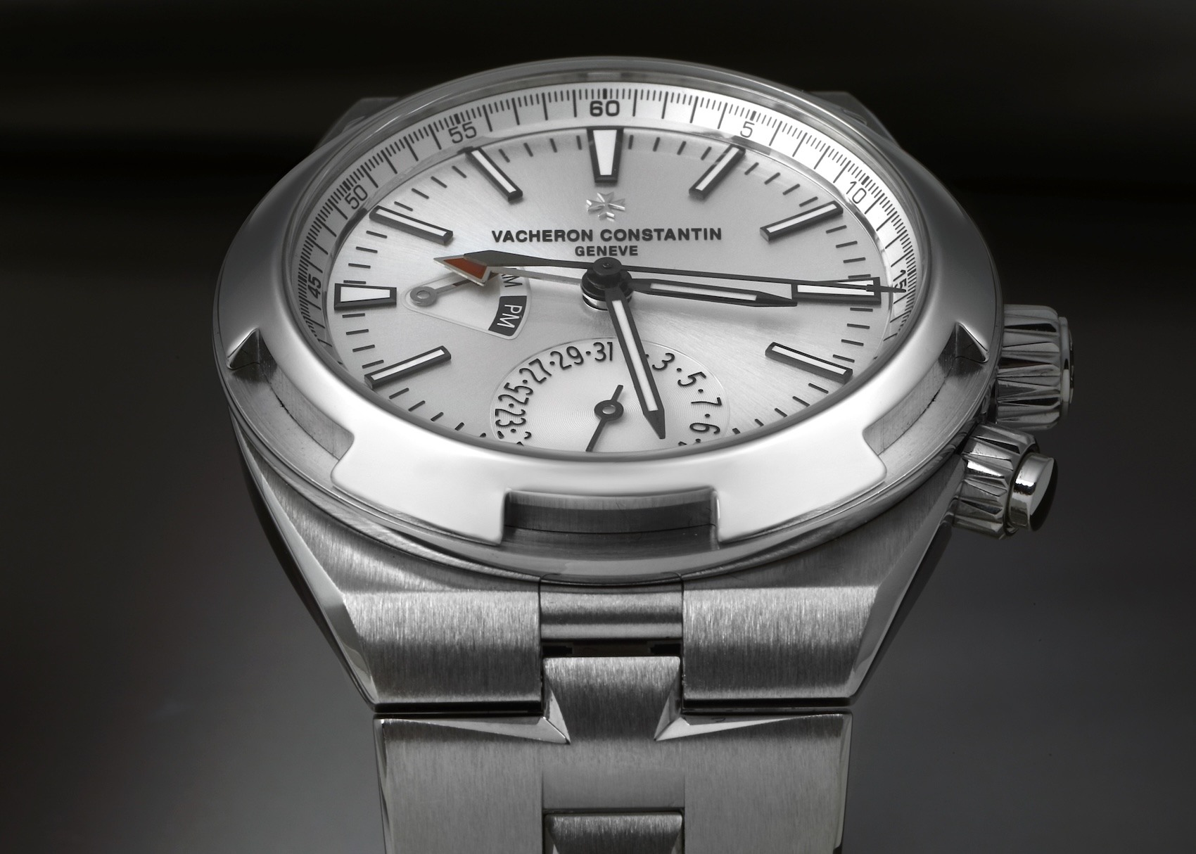 Vacheron Constantin Overseas Dual Time steel watch with a silver dial, matching the Pantone Cloud Dancer 2026 color trend.