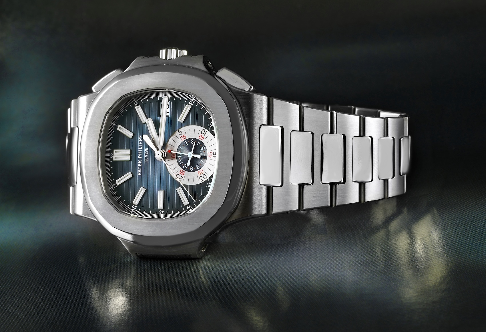 Close-up of the Patek Philippe Nautilus Chronograph 5980/1A-001 in stainless steel with a blue gradient dial and monocounter.