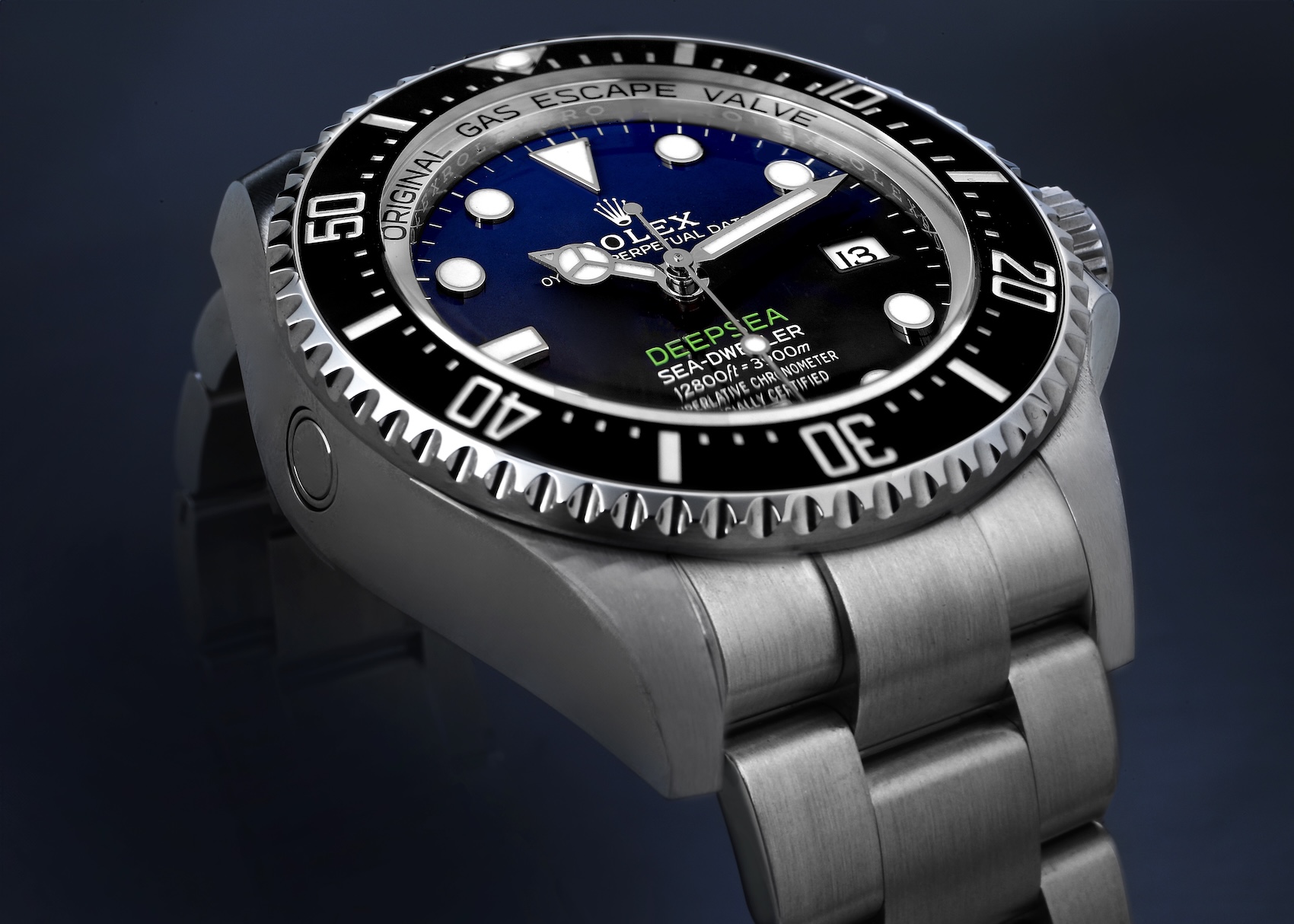 Side view of Rolex Deepsea 136660 D-Blue showing the thick sapphire crystal, gas escape valve, and Oystersteel case architecture.