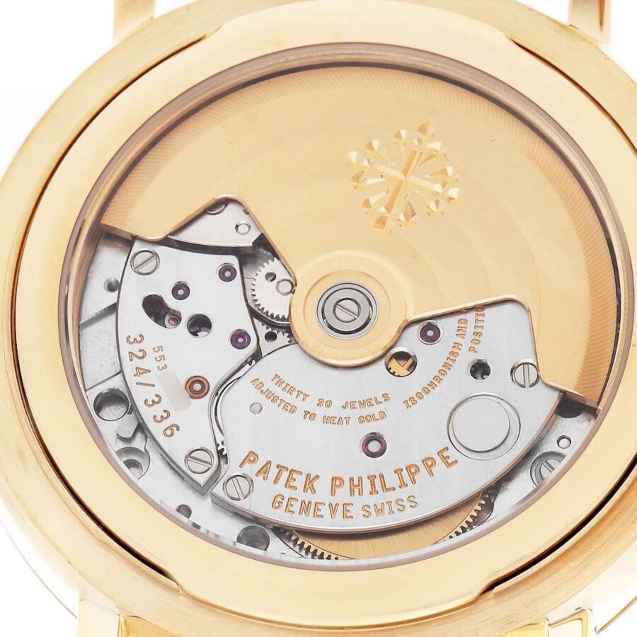 Macro view of the Patek Philippe self-winding Caliber 324 S QR movement with a 21k gold rotor and the Patek Philippe Seal.
