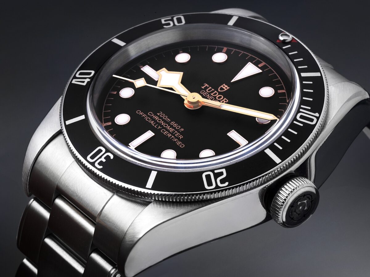 Close up of Tudor Black Bay 58 Gilt dial with snowflake hands on steel bracelet.