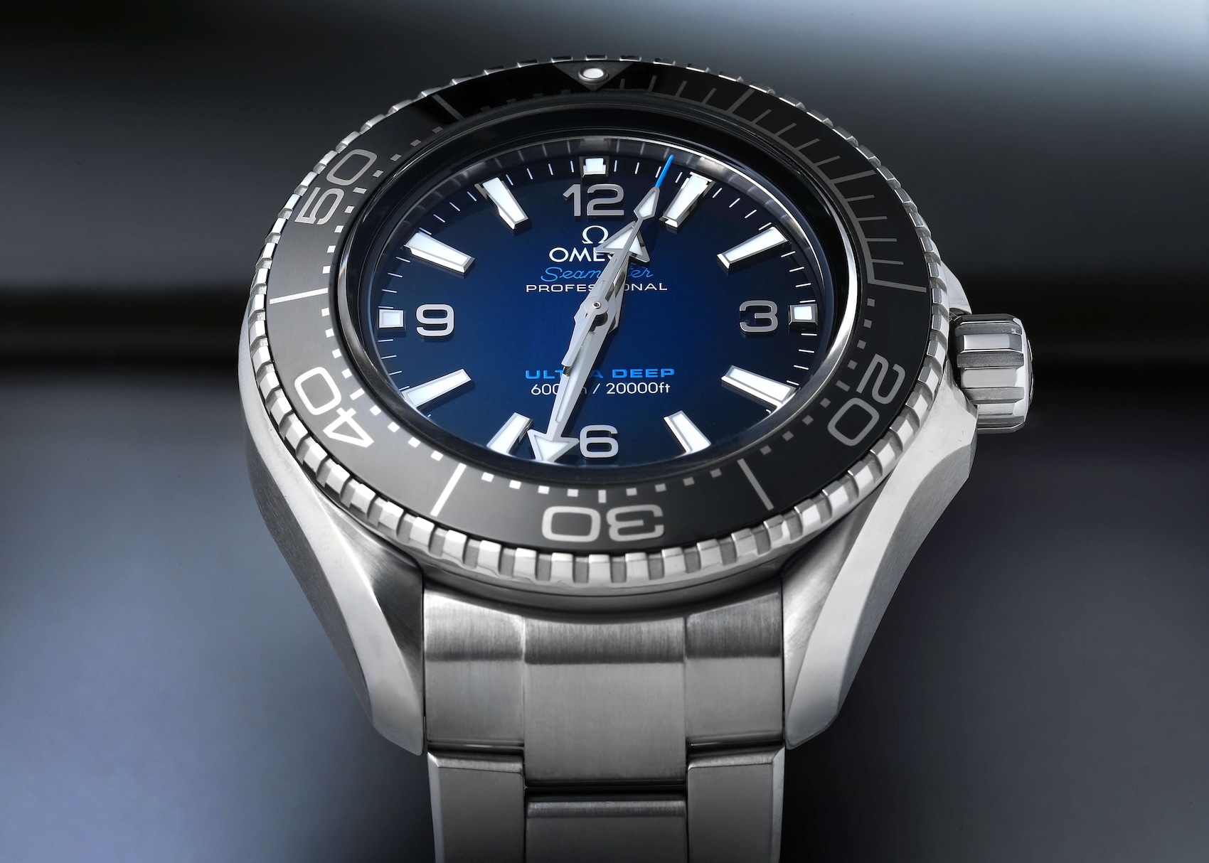 Front view of the Omega Seamaster Planet Ocean Ultra Deep with blue gradient dial and O-MEGASTEEL case.
