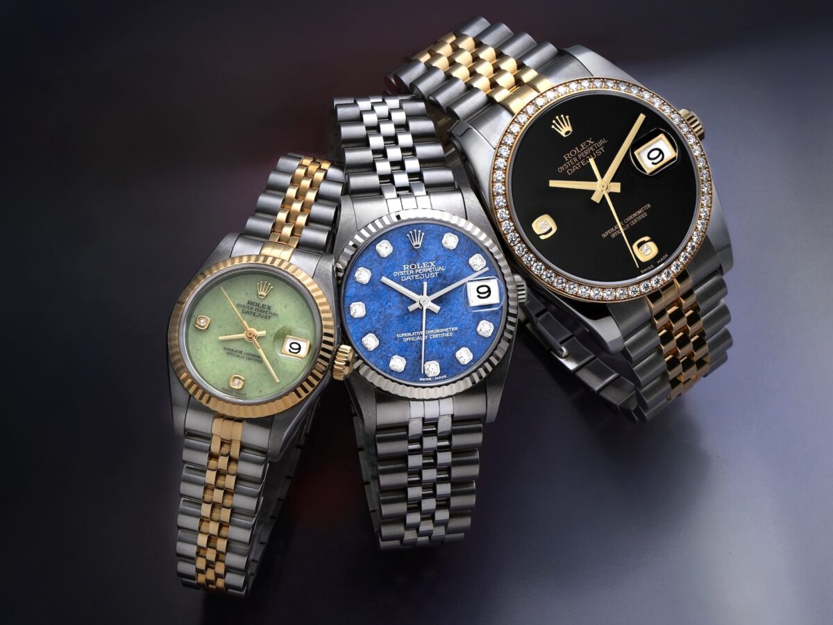 A trio of Rolex Datejust watches featuring exotic stone dials in jadeite, sodalite, and onyx.