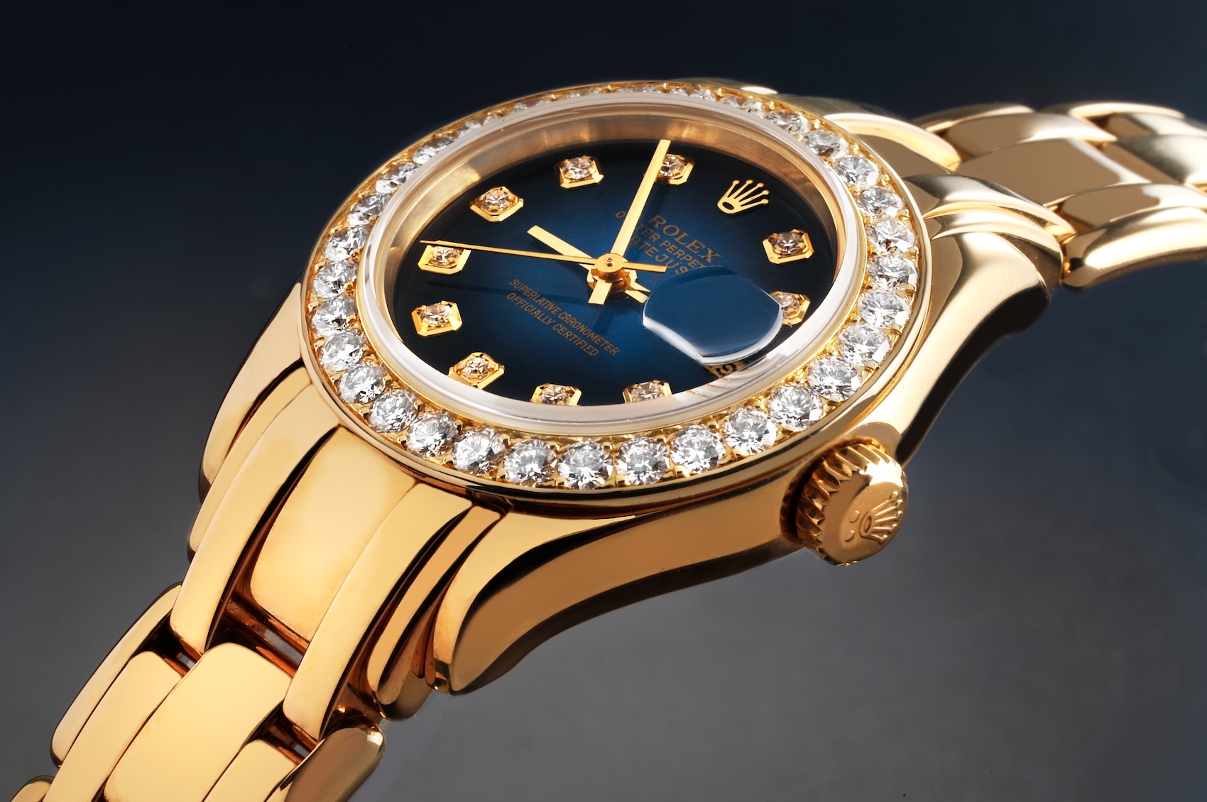 18k yellow gold Rolex Pearlmaster ref 69298 with a diamond bezel and Twinlock winding crown.
