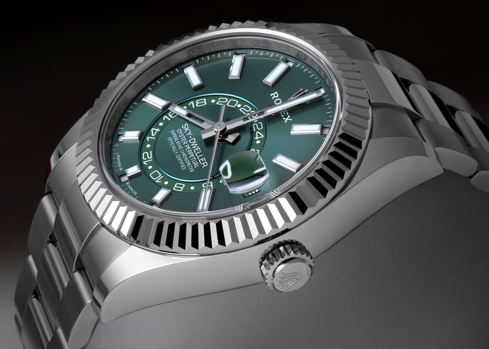 Stainless steel and white gold Rolex Sky-Dweller ref 336934 featuring a Twinlock crown with a single dash marking under the coronet.