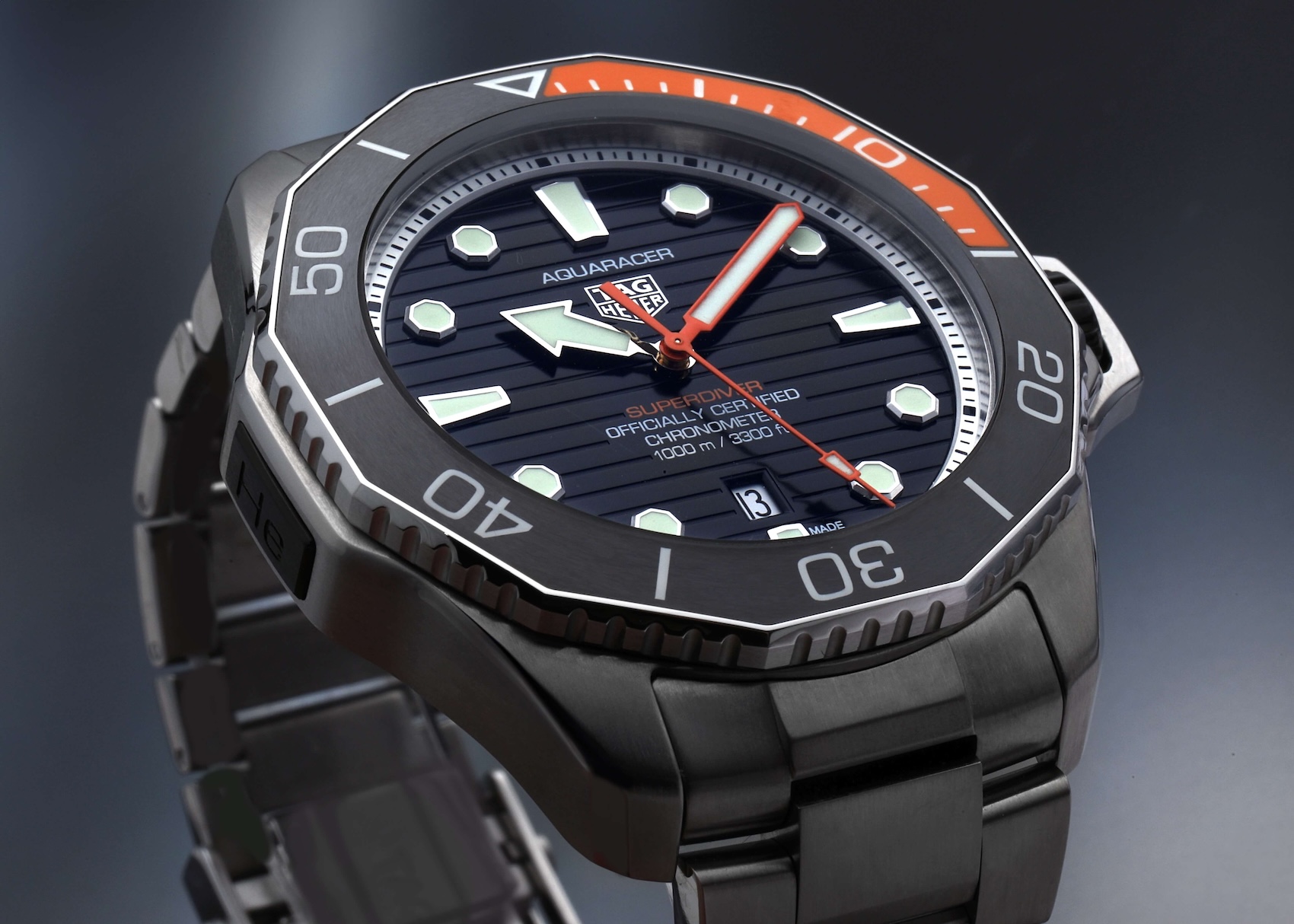 TAG Heuer Aquaracer Professional 1000 Superdiver with orange bezel accents and titanium case.