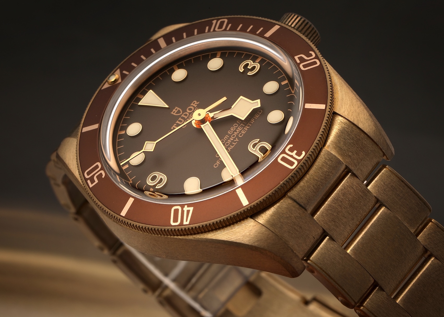 Macro shot of Tudor Black Bay 58 Bronze dial showing the "Chronometer Officially Certified" text.