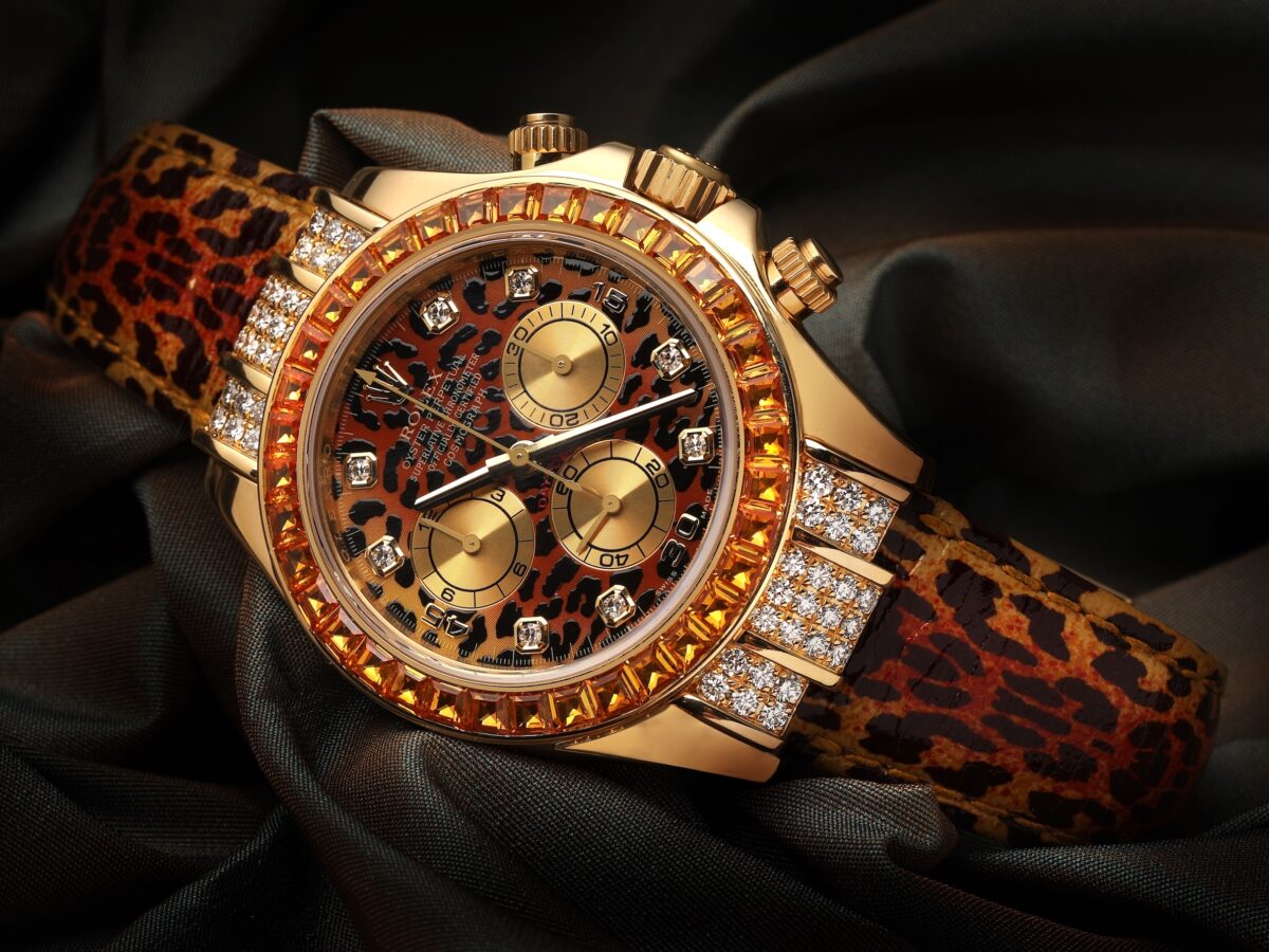 Rolex Cosmograph Daytona Leopard 116598 with diamond dial and cognac sapphire bezel