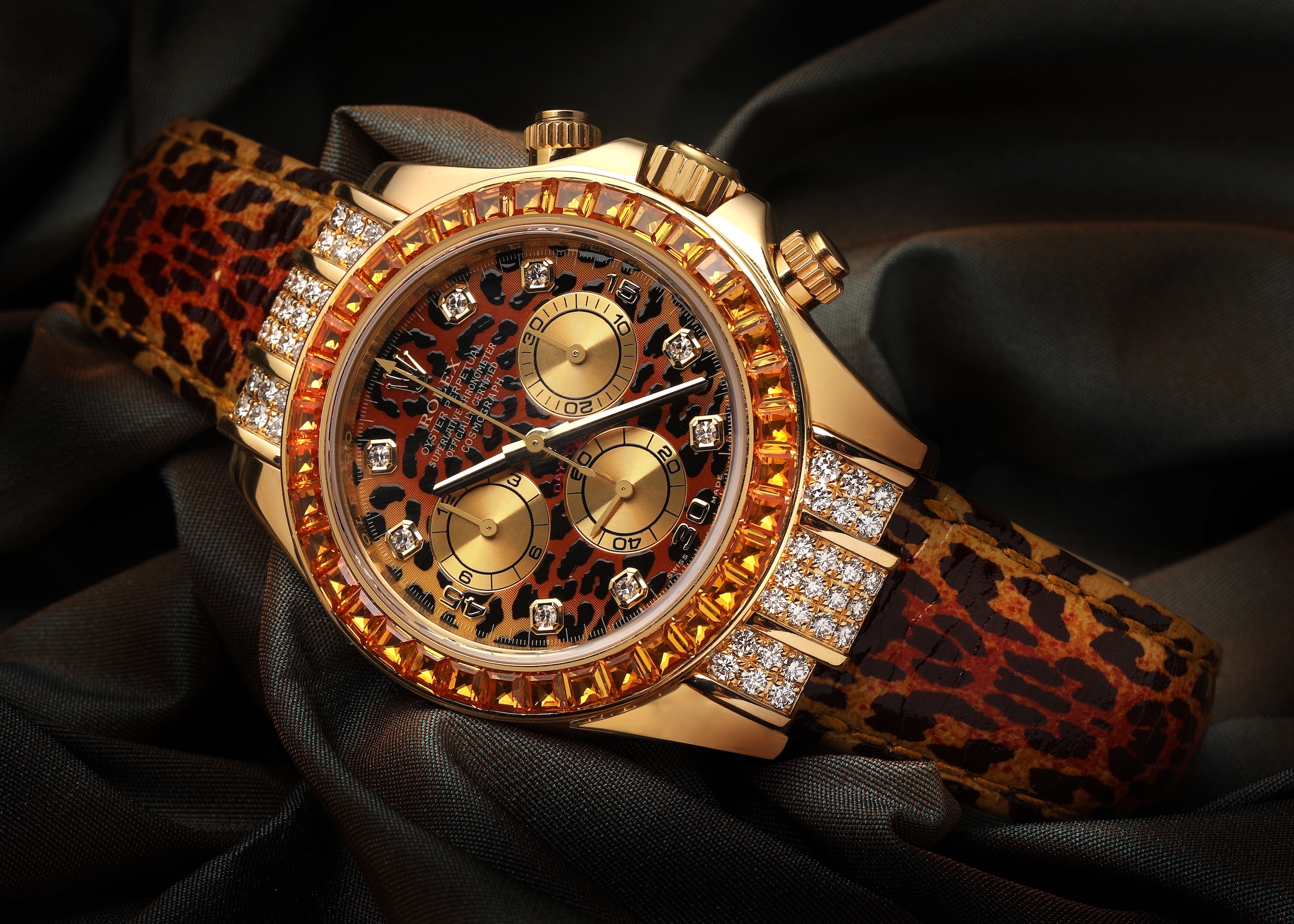 Rolex Cosmograph Daytona Leopard 116598 with diamond dial and cognac sapphire bezel