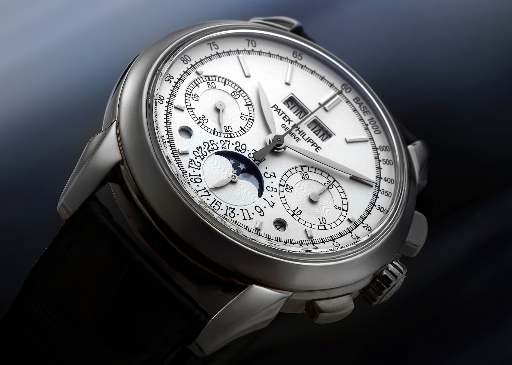 Angled profile view of the Patek Philippe 5270G in white gold highlighting the polished case, stepped lugs, and rectangular chronograph pushers.