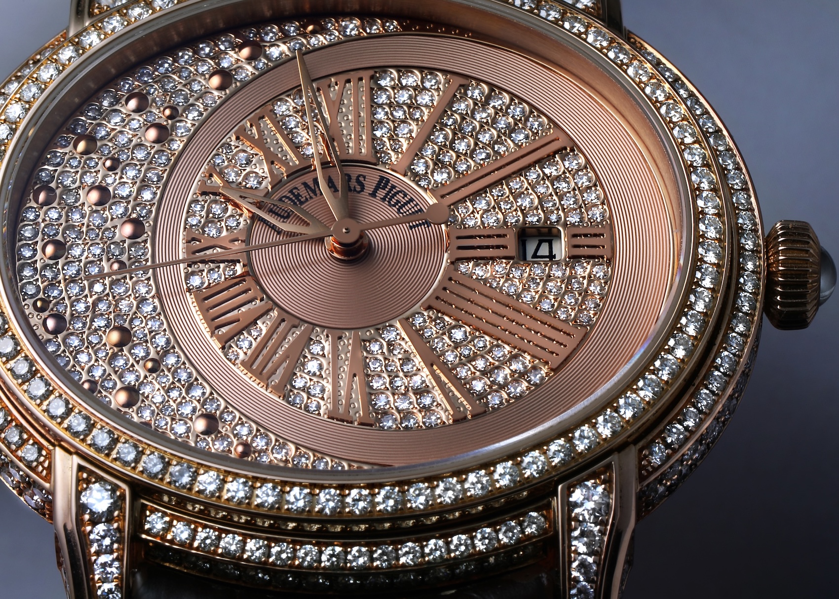 Close-up detail of the Audemars Piguet Millenary Morita diamond-paved dial, Roman numerals, and asymmetrical rose gold case.