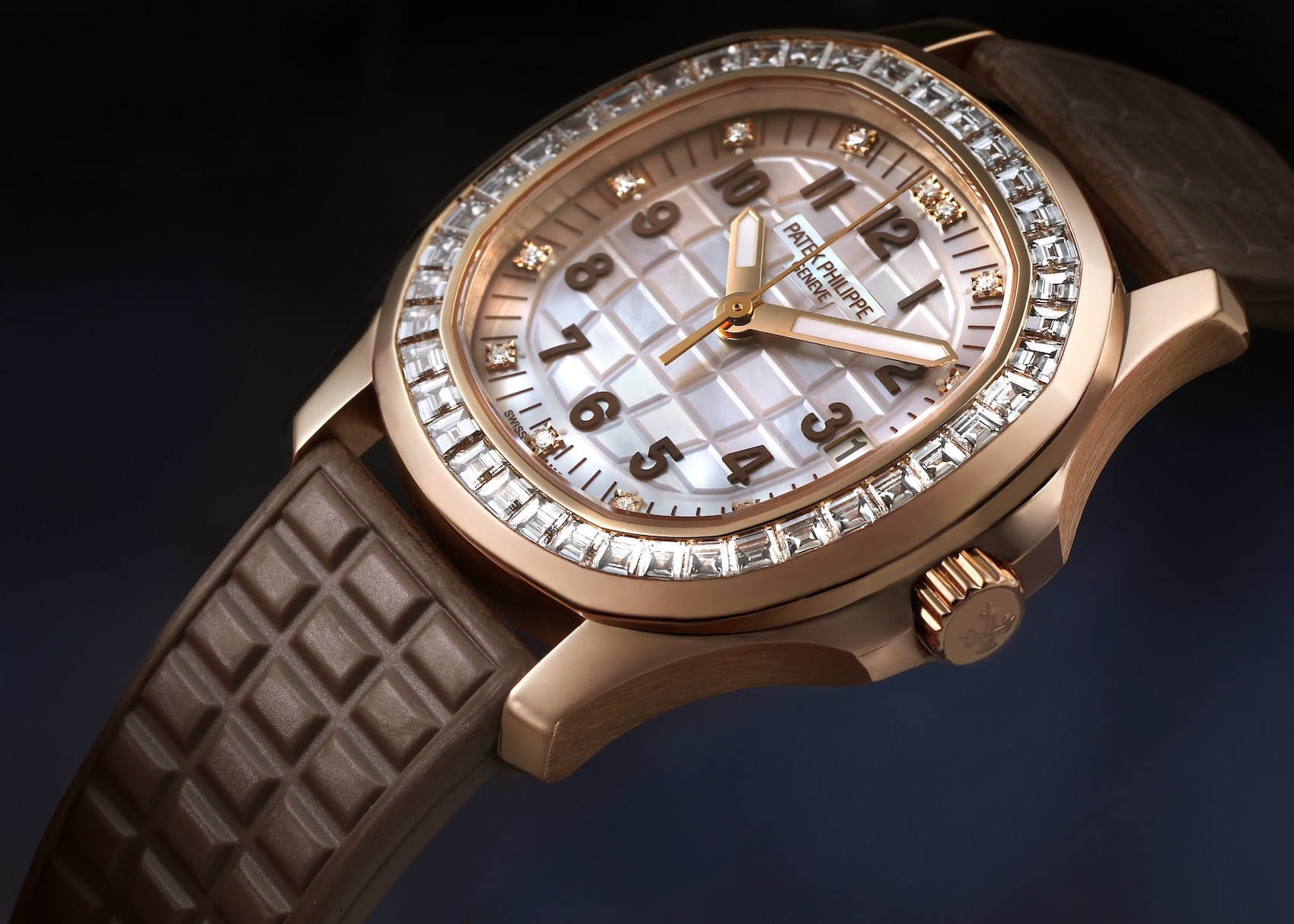 Patek Philippe Aquanaut Luce Joaillerie 5072R rose gold watch with baguette diamond bezel and mother-of-pearl dial. 