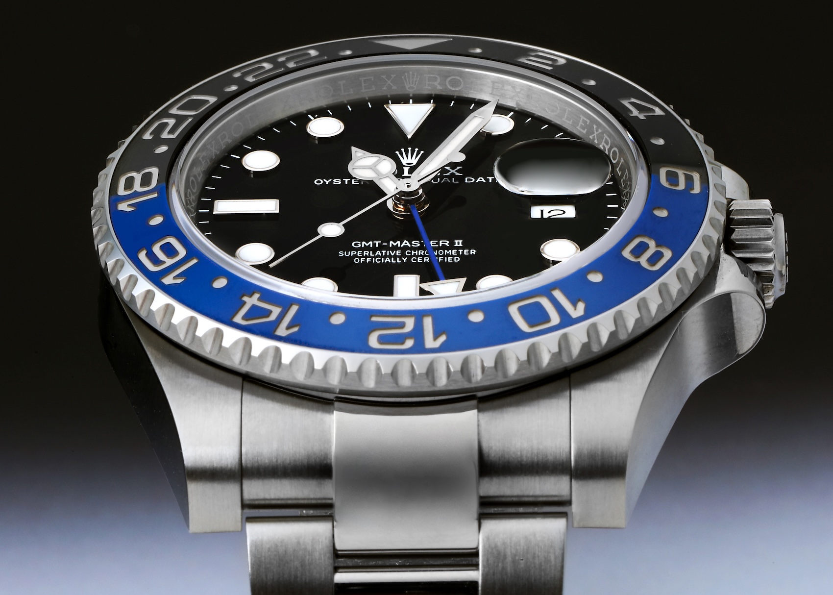 Close up of the Rolex GMT-Master II Batman 126710BLNR on an Oyster bracelet featuring the blue and black ceramic bezel.