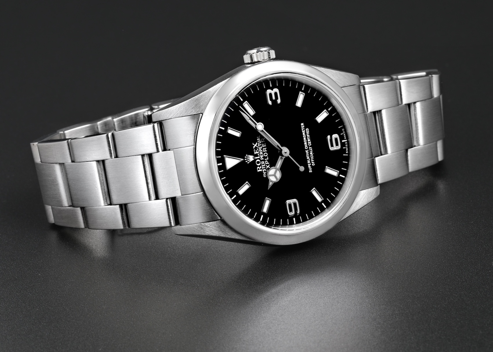 Rolex Explorer Reference 14270 with a black dial and applied white gold 3-6-9 indices on a stainless steel Oyster bracelet.