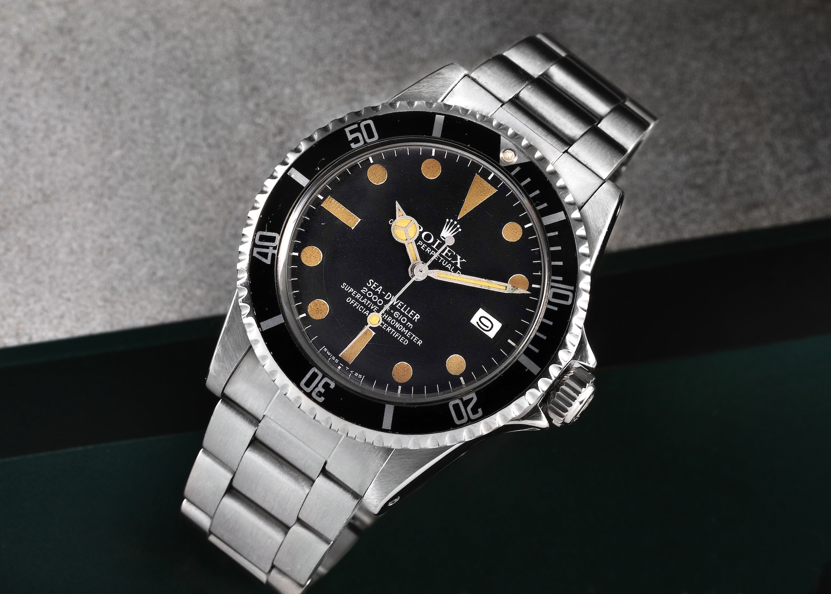 Vintage Rolex Sea-Dweller Reference 1665 Great White dial with a thick acrylic crystal and stainless steel case.