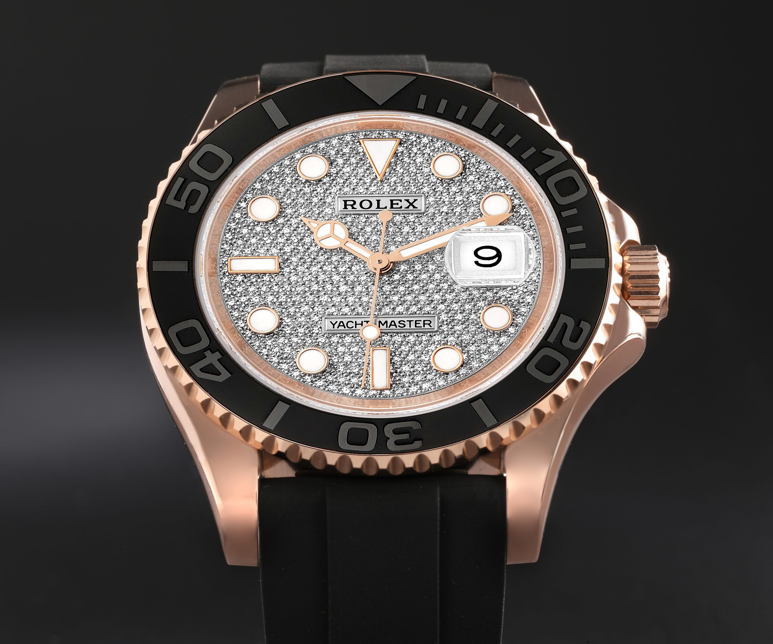 The discontinued Rolex Yacht-Master in Everose gold featuring a diamond-paved dial, matte black Cerachrom bezel, and Oysterflex bracelet.