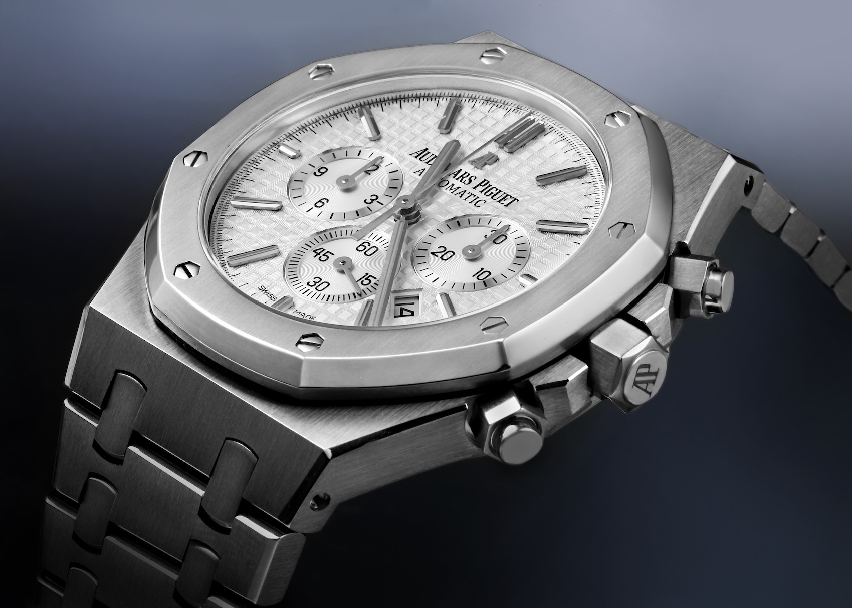 Side angle view of the stainless steel Audemars Piguet Royal Oak Chronograph Ref. 26320ST featuring a silver Grande Tapisserie dial.