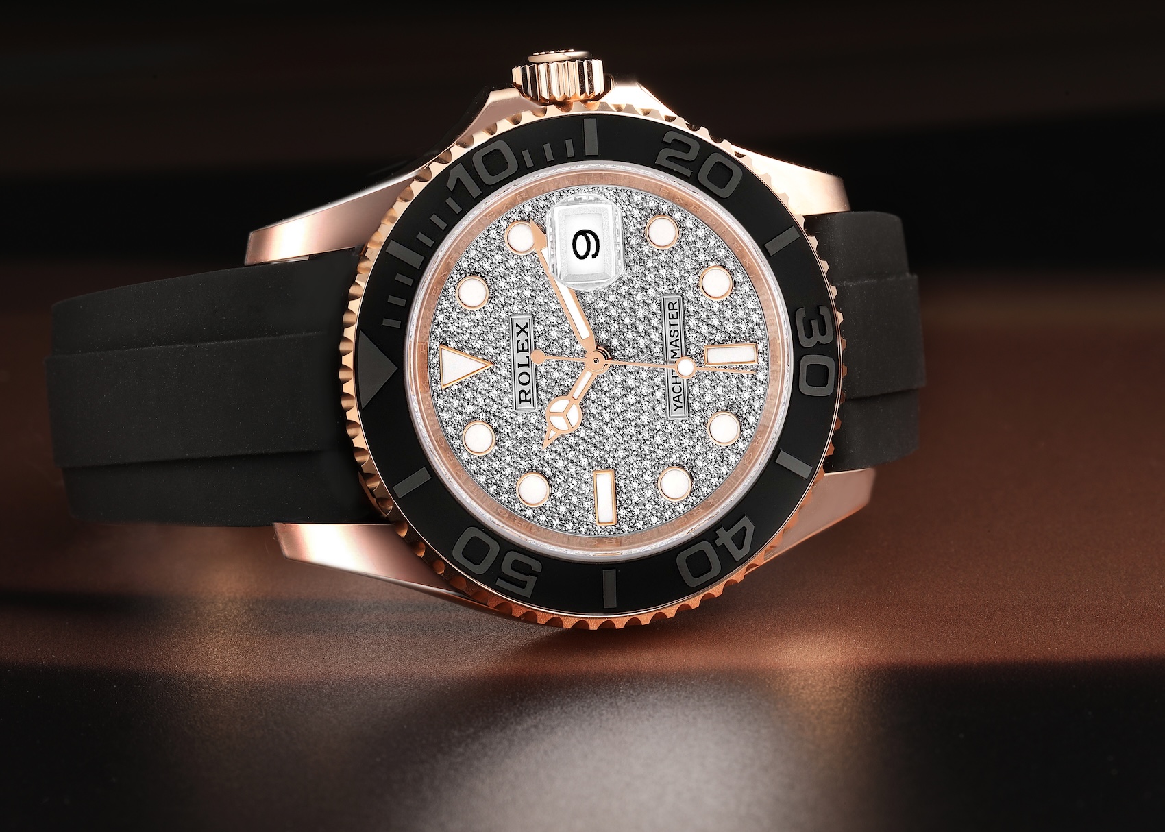 Rolex Yacht-Master 40 ref 116655 in 18k Everose gold featuring a factory diamond pave dial, matte black Cerachrom bezel, and Oysterflex strap.