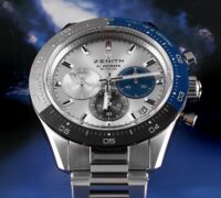 Front-facing view of the Zenith Chronomaster Sport displaying its high-contrast white dial, distinct blue, anthracite, and light grey subdials, and blue ceramic bezel.