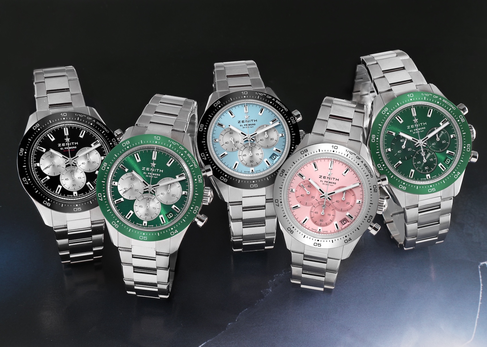 A collection of limited edition Zenith Chronomaster Sport watches showcasing various dial colors including black, green, ice blue, and pink on stainless steel bracelets.