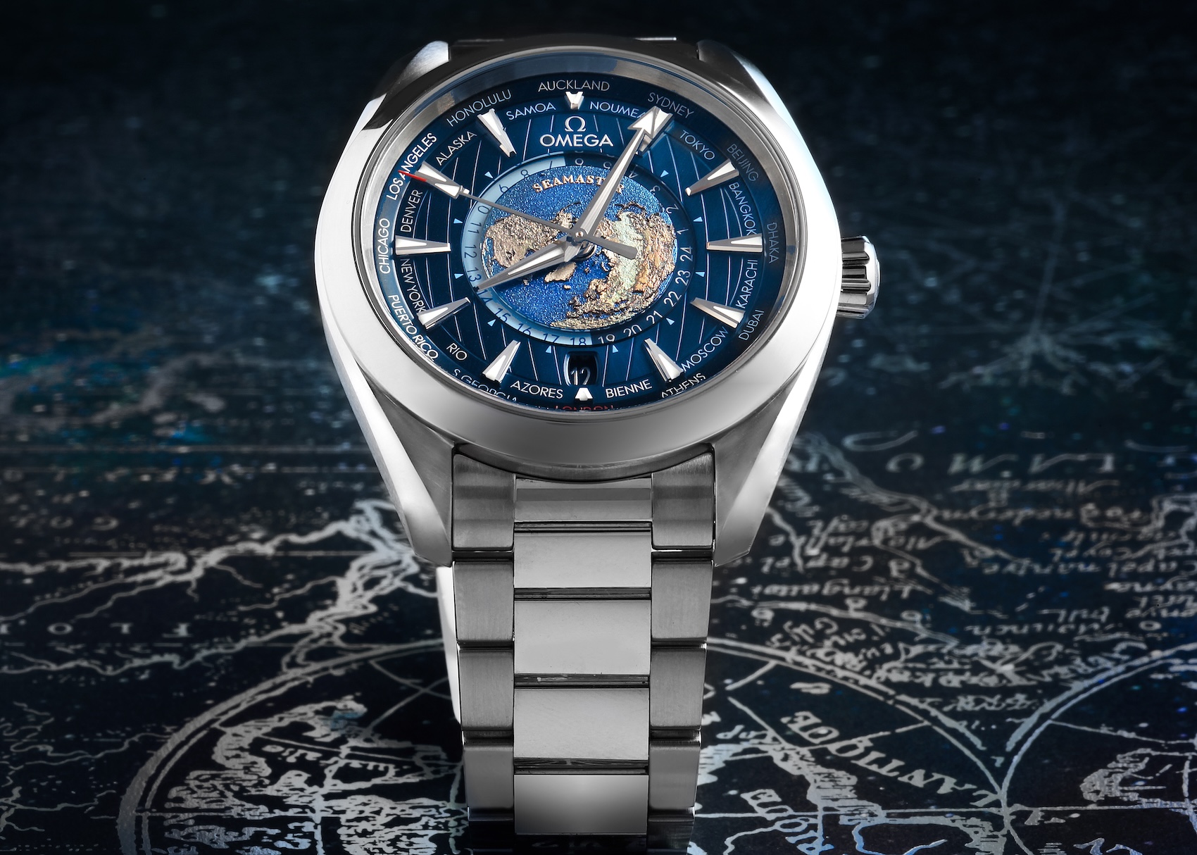 Omega Seamaster Aqua Terra Worldtimer in stainless steel with a blue ocean dial and teak deck pattern.