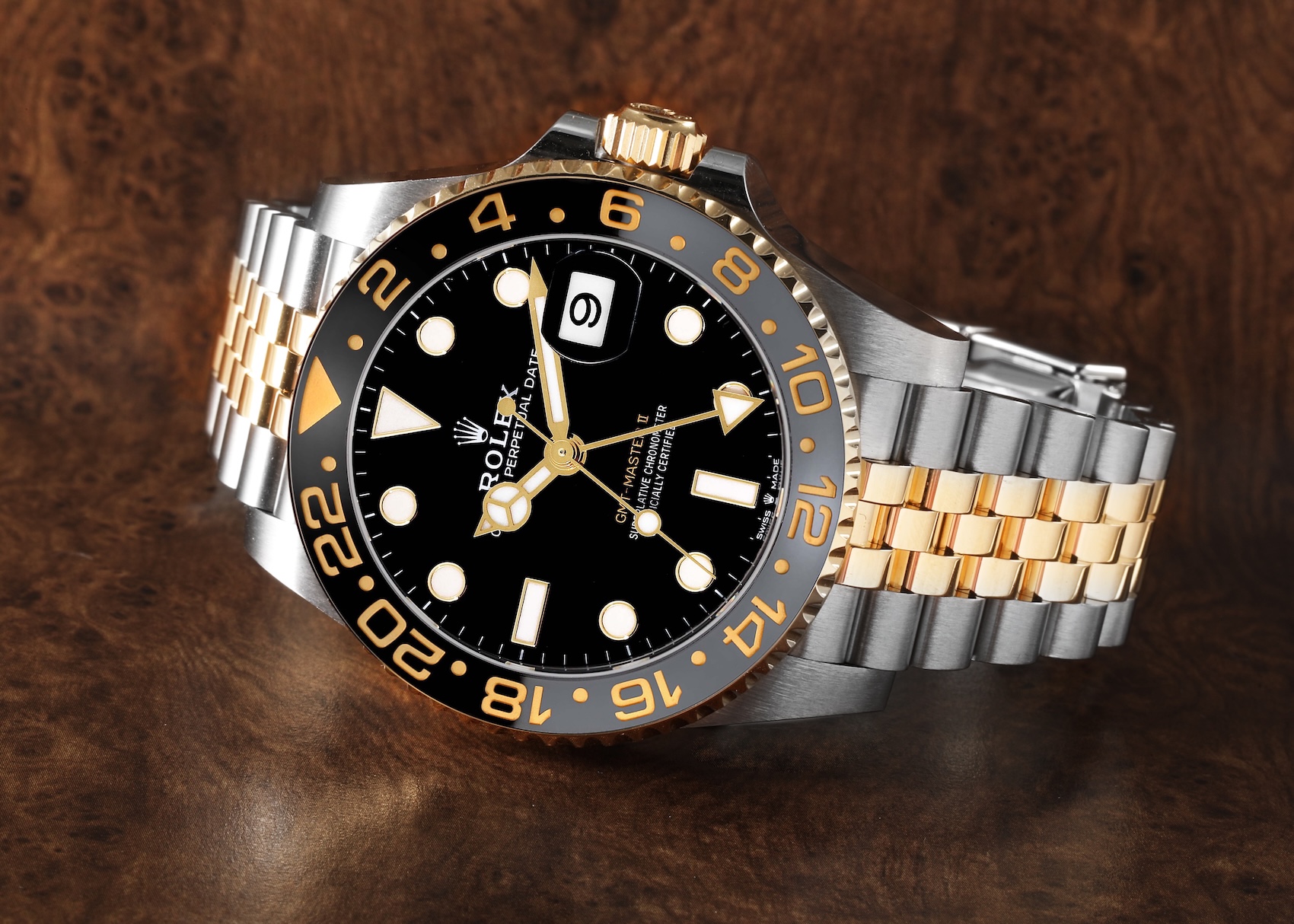 Two-tone Rolex GMT-Master II 126713GRNR in steel and 18k yellow gold with a black and grey ceramic bezel on a five-link Jubilee bracelet.