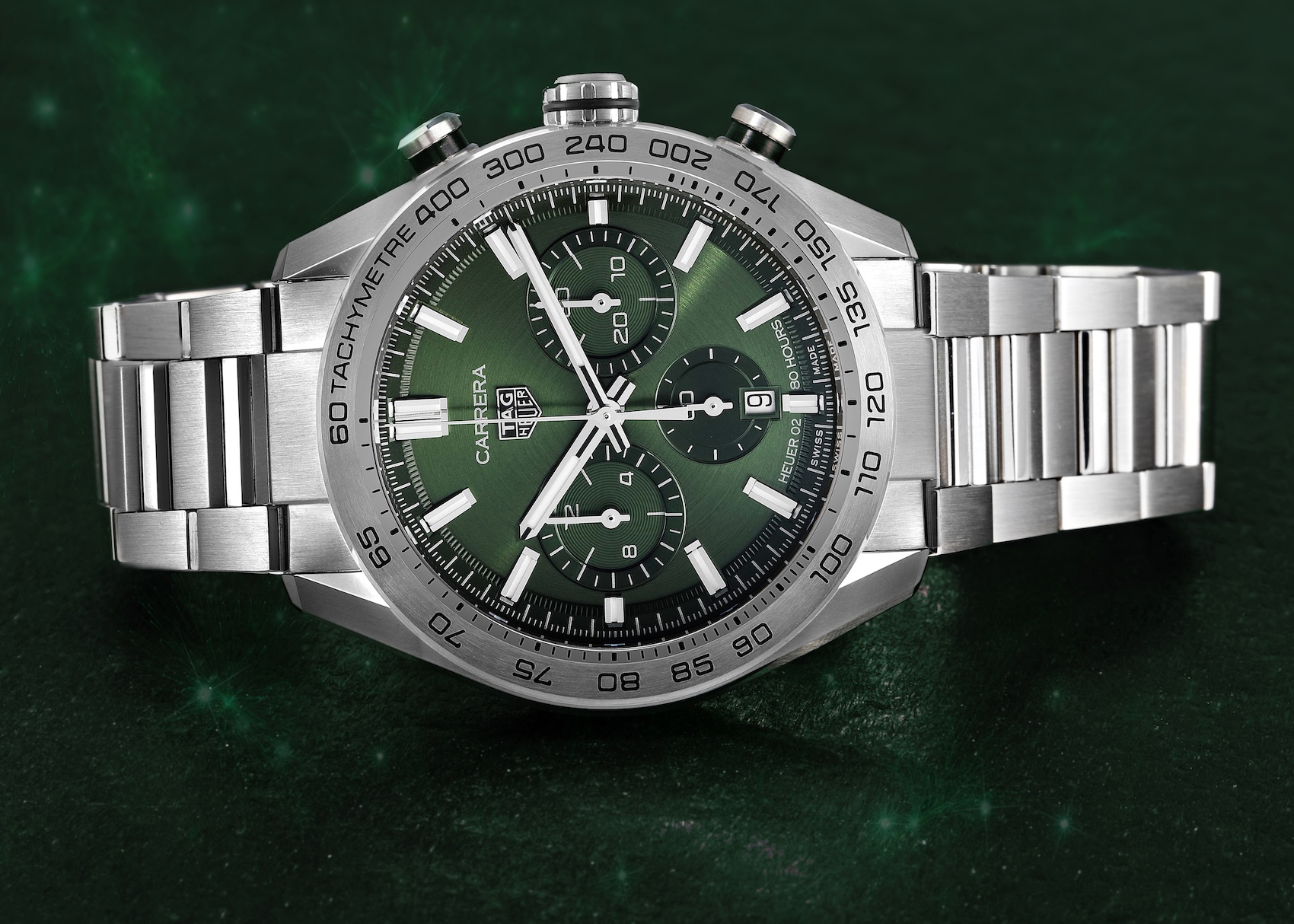 Front view of a stainless steel TAG Heuer Carrera Chronograph reference CBN2A10 featuring a circular brushed green dial and steel three-link bracelet.