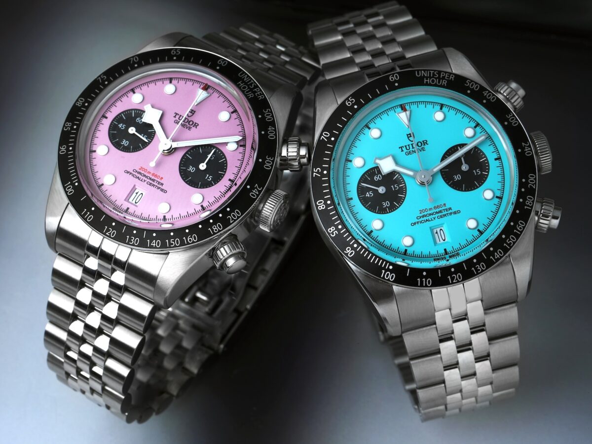 Tudor Black Bay Chrono Miami Pink and Flamingo Blue side by side on steel bracelets