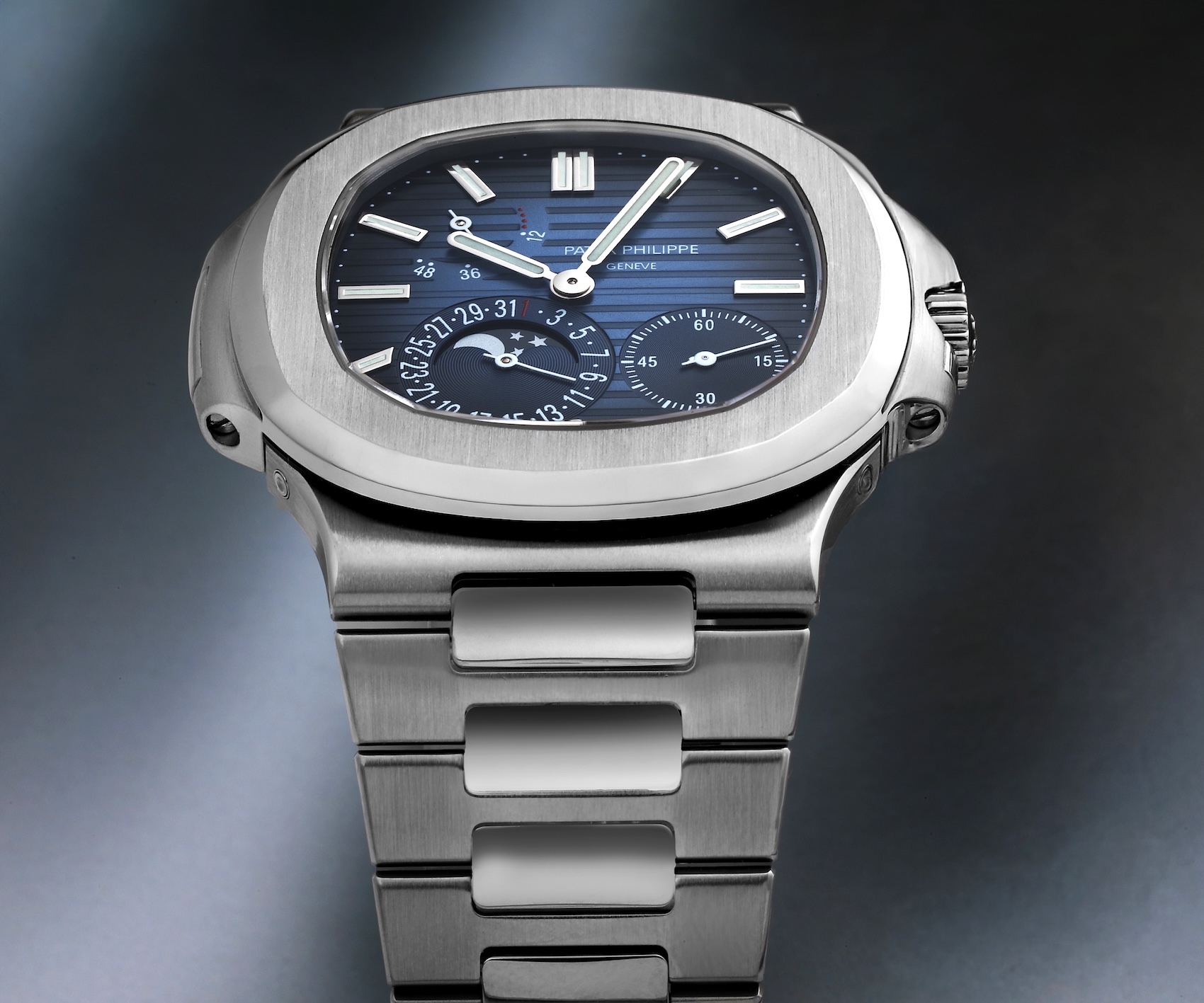 Head-on view of the Patek Philippe Nautilus 5712/1A in stainless steel, highlighting the thin case profile and integrated bracelet.