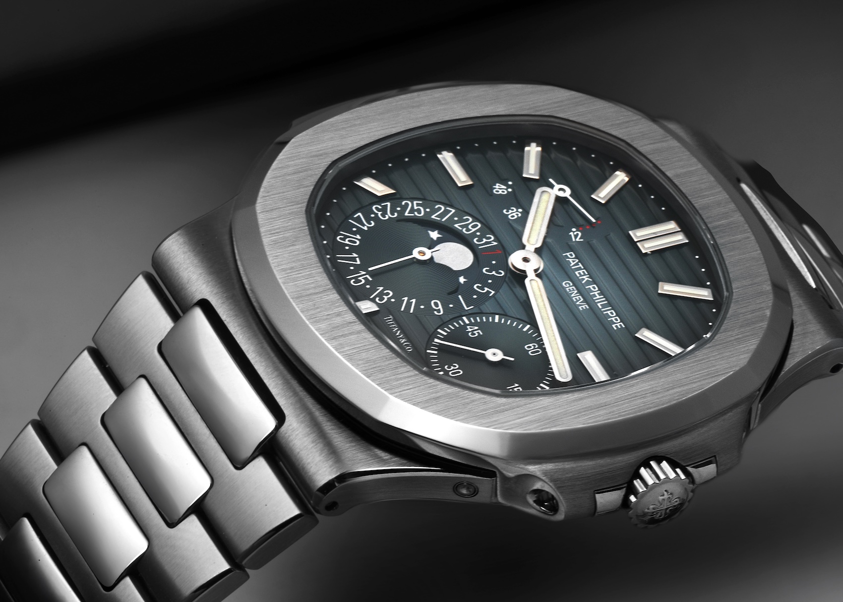 Close-up of the Patek Philippe Nautilus 5712/1A Stainless Steel with the highly coveted Tiffany & Co. stamp on the dial.